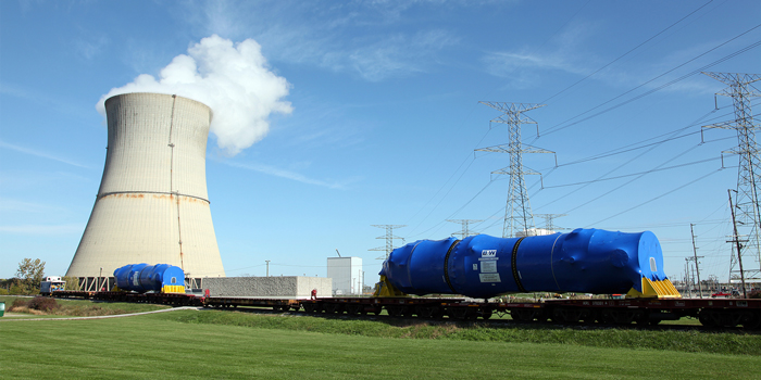 Two new steam generators are delivered by rail to the Davis-Besse Power Station in Oak Harbor for installation in spring 2014