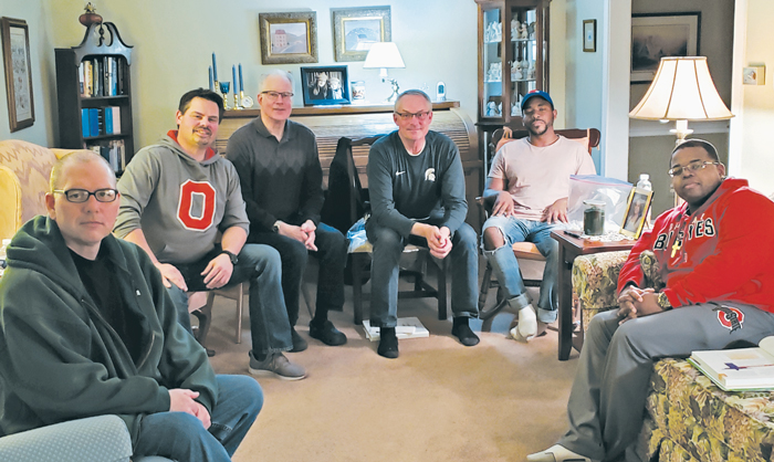 Tom Ostrosky (second from left) at a meeting of the Lazarus Experience’s First Relationship Disciple Team