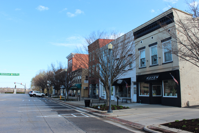 Closed stores in downtown Perrysburg highlight the pressures faced by small business owners from COVID-19