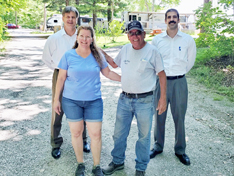 Nelson Shaffer and Dan Saad, Citizens National Bank (back) and Joan and Randy Faneuff, Leafy Oaks Campground (front)